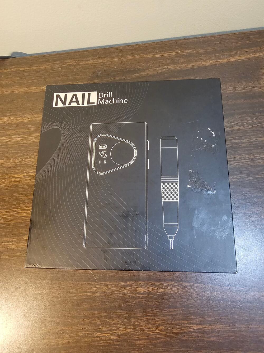 rechargeable electric nail drill machine w LCD screen and a matching handpiece.